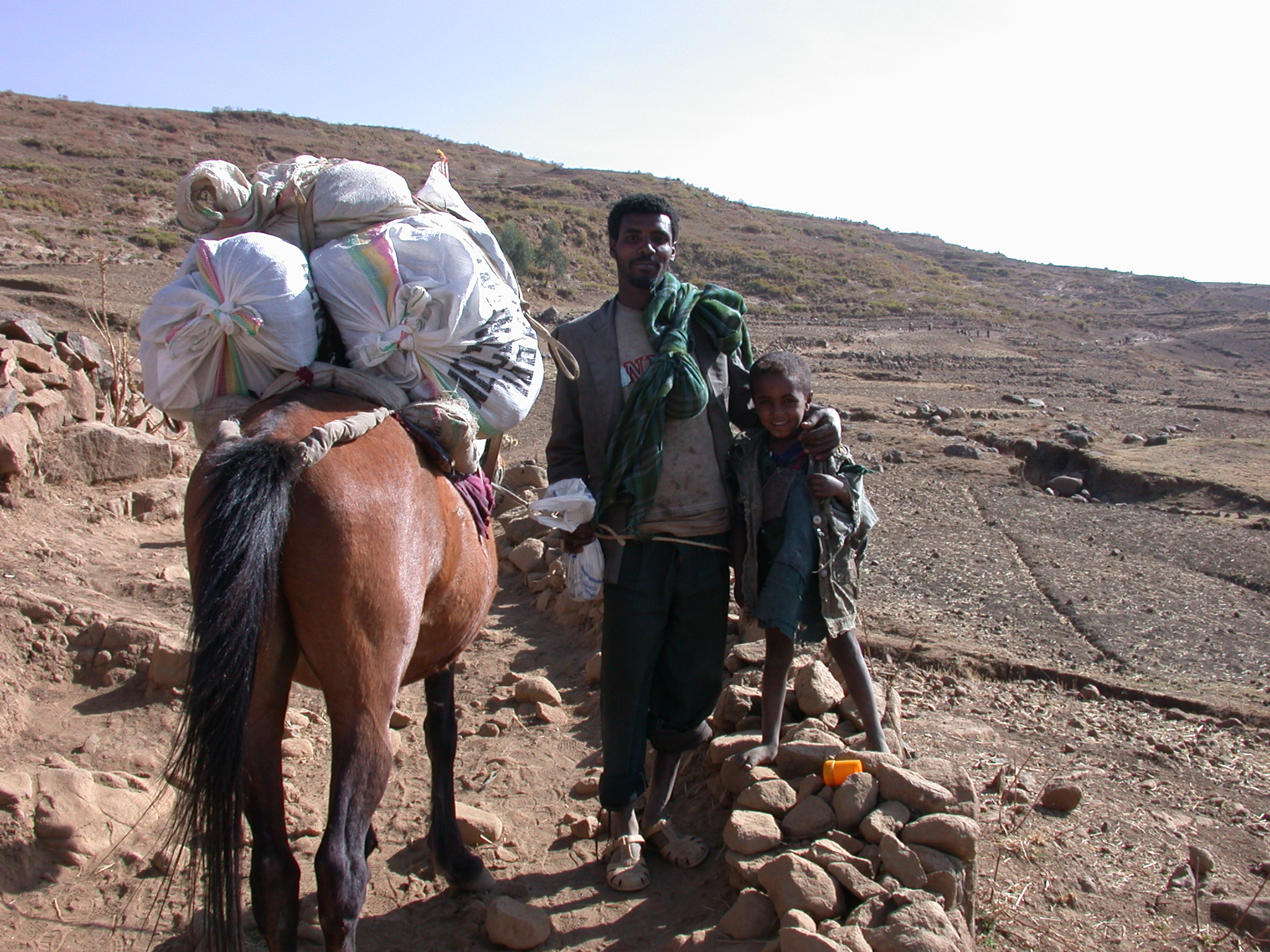 Horse Tender and His Son on Trek from Debark to Sankaber, Simien Mountains, Ethiopia