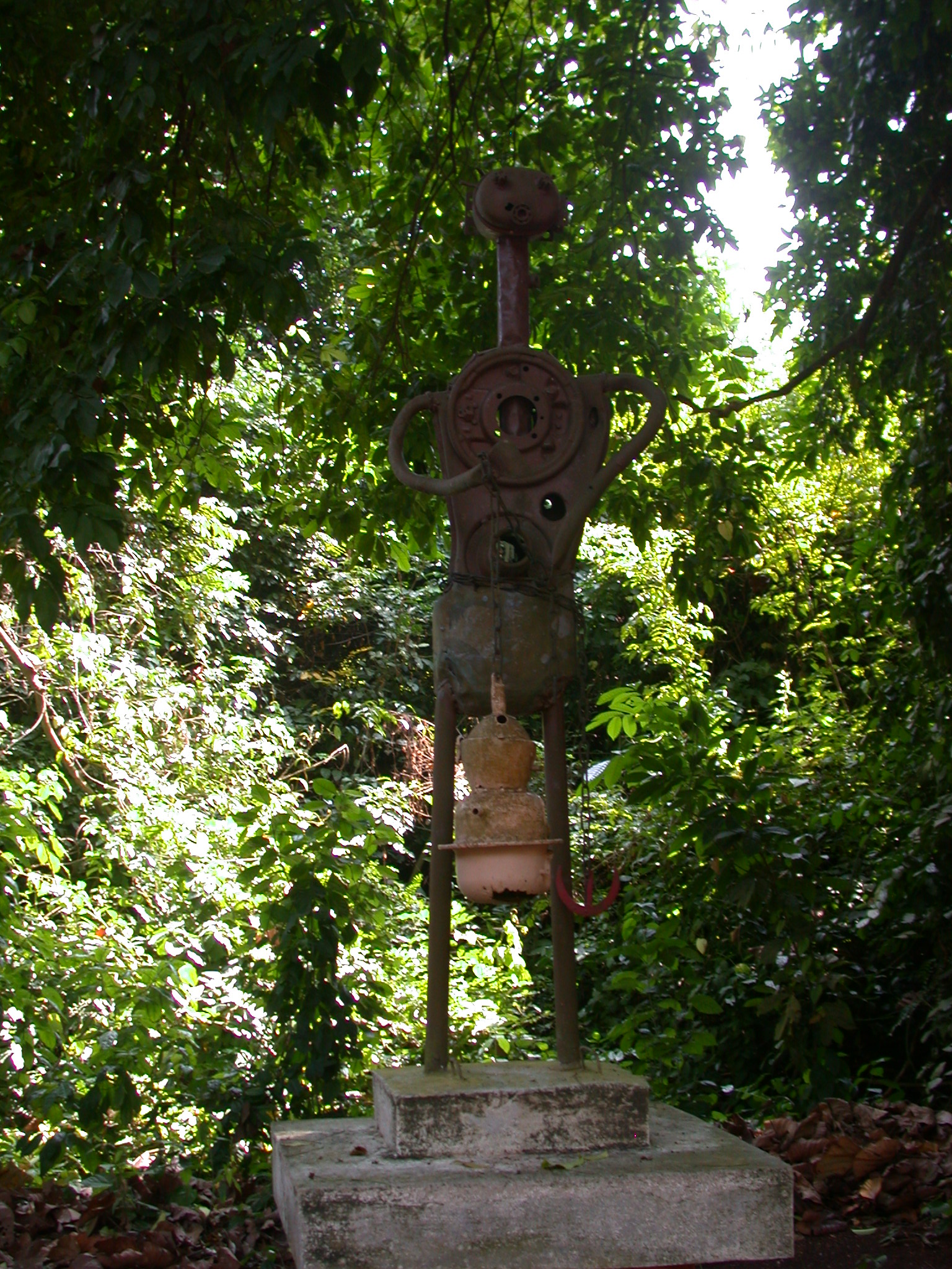 Sculpture of Priest Holding Xeviosso-Shaped Censer, Kpasse Sacred Forest, Ouidah, Benin