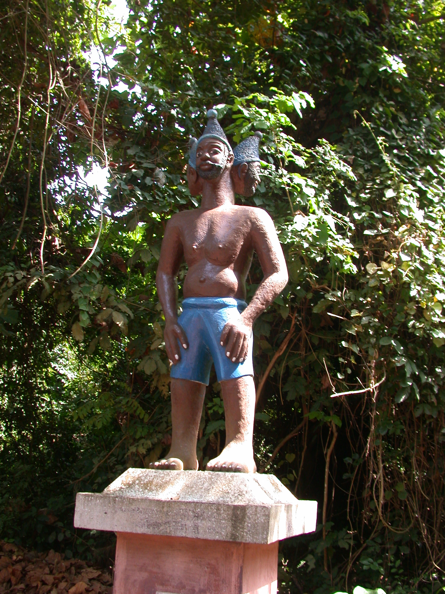 Sculpture of Three-Headed Indian God Densu and Husband of Mami Wata, Kpasse Sacred Forest, Ouidah, Benin