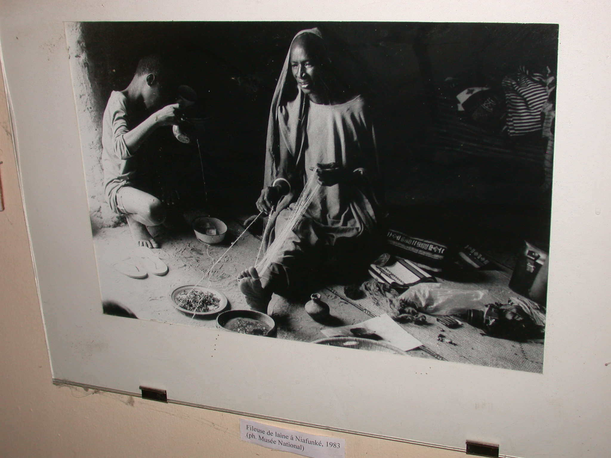 Photo of Wool Spinner at Niafunke in 1983, Timbuktu Ethnological Museum, Timbuktu, Mali