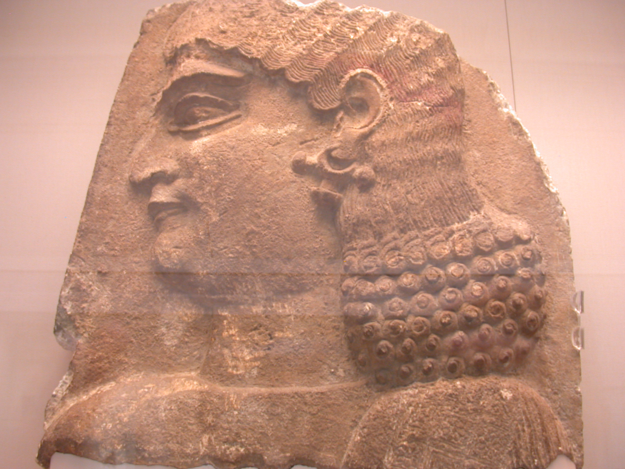 Head of a Eunuch Wearing Red Headband, Gypsum Wall Panel, About 710 BCE, Palace of Sargon, Khorsabad, Assyria, in British Museum, London, England